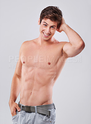 Buy stock photo Happy, portrait and handsome man with muscular body in fitness, health or wellness on a gray studio background. Attractive, young male person or model with smile and abs in confidence or satisfaction