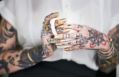 Buy stock photo Woman, closeup and hands with tattoos or coffee for morning caffeine, tea break and relax with grunge aesthetic. Person, mug and manicure with warm beverage or cappuccino for energy and breakfast