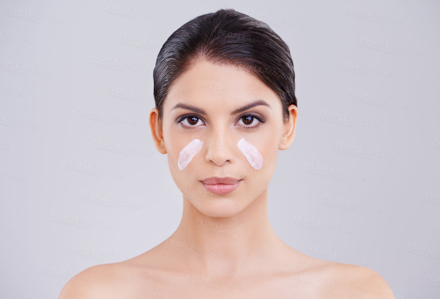 Buy stock photo Woman, portrait and skincare moisturizer in studio or dermatology lotion, sunscreen or grey background. Female person, face and wellness cream for beauty transformation, self care or mockup space