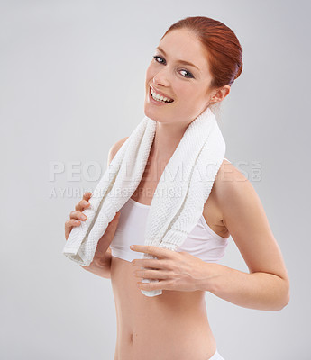 Buy stock photo Portrait, smile and woman with fitness, towel and healthy athlete on a white studio background. Face, person and model with happiness and weight loss with exercise and workout with training or sports