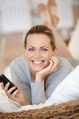 Buy stock photo Relax, phone or portrait of happy woman on couch streaming movie or film on internet or website. Smile, chat or female person in home texting on online on mobile app to search for social media post