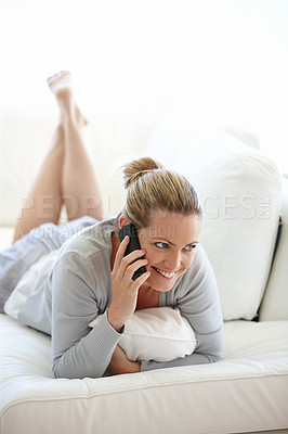 Buy stock photo Thinking, happy woman or phone call in home talking or speaking in living room for communication. Ideas, mobile or person with smile in conversation to relax on couch or sofa in a house for a break 