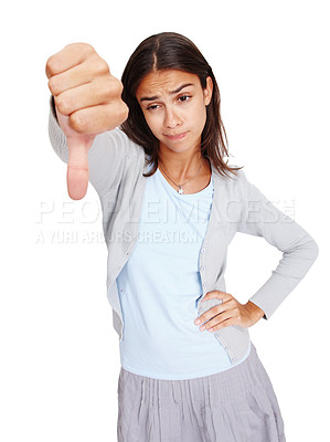 Buy stock photo Thumbs down, bad and young woman in studio with a stylish, trendy and casual cool outfit. Unhappy, upset and female model with a negative or disagree hand sign or gesture isolated by white background