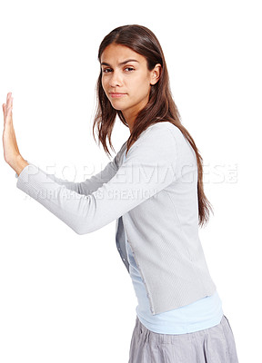 Buy stock photo Portrait, push and mockup with a woman in studio isolated on a white background for effort or moving. Mock up, poster or billboard with an attractive young female pushing blank space for presentation
