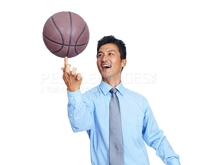 Buy stock photo Asian businessman, happy and basketball on finger for corporate fun, comic energy and sports mindset in white background. Korean man, smile and basketball player in formal clothes isolated in studio