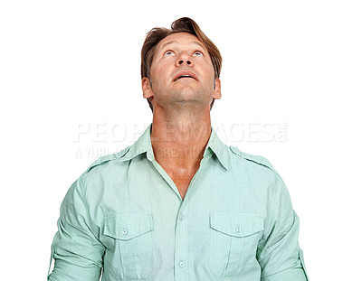 Buy stock photo Idea, mature and man looking up in a studio with uncertainty, wonder and contemplation. Thinking, pensive and handsome male model daydreaming in a casual outfit while isolated by a white background.