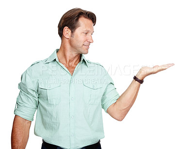 Buy stock photo Business, man looking at hand out for product placement and mockup space isolated on white background. Marketing, advertising launch and product announcement or presentation, businessman in studio.