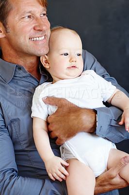 Buy stock photo Dad, love and relax with baby for safety, weekend and childhood development with smile on fathers day. Family, father and boy toddler with man for happiness, bonding and support in infant growth