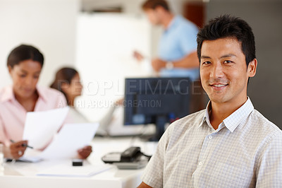 Buy stock photo Portrait, Asian man and computer at office for meeting with telephone, colleagues and work. Male consultant, online and  in workplace with collaboration, project and working for business growth