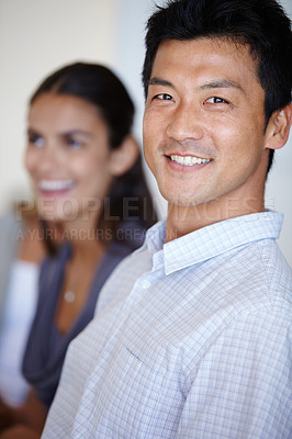 Buy stock photo Shot of two business people seated in an office environment
