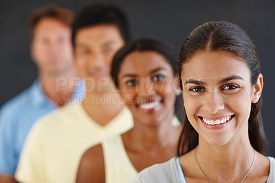 Buy stock photo Diversity, coworker and row with smile for teamwork or collaboration and coworking with dark background as graphic designers. Portrait, colleagues and people as employees in happiness for growth. 