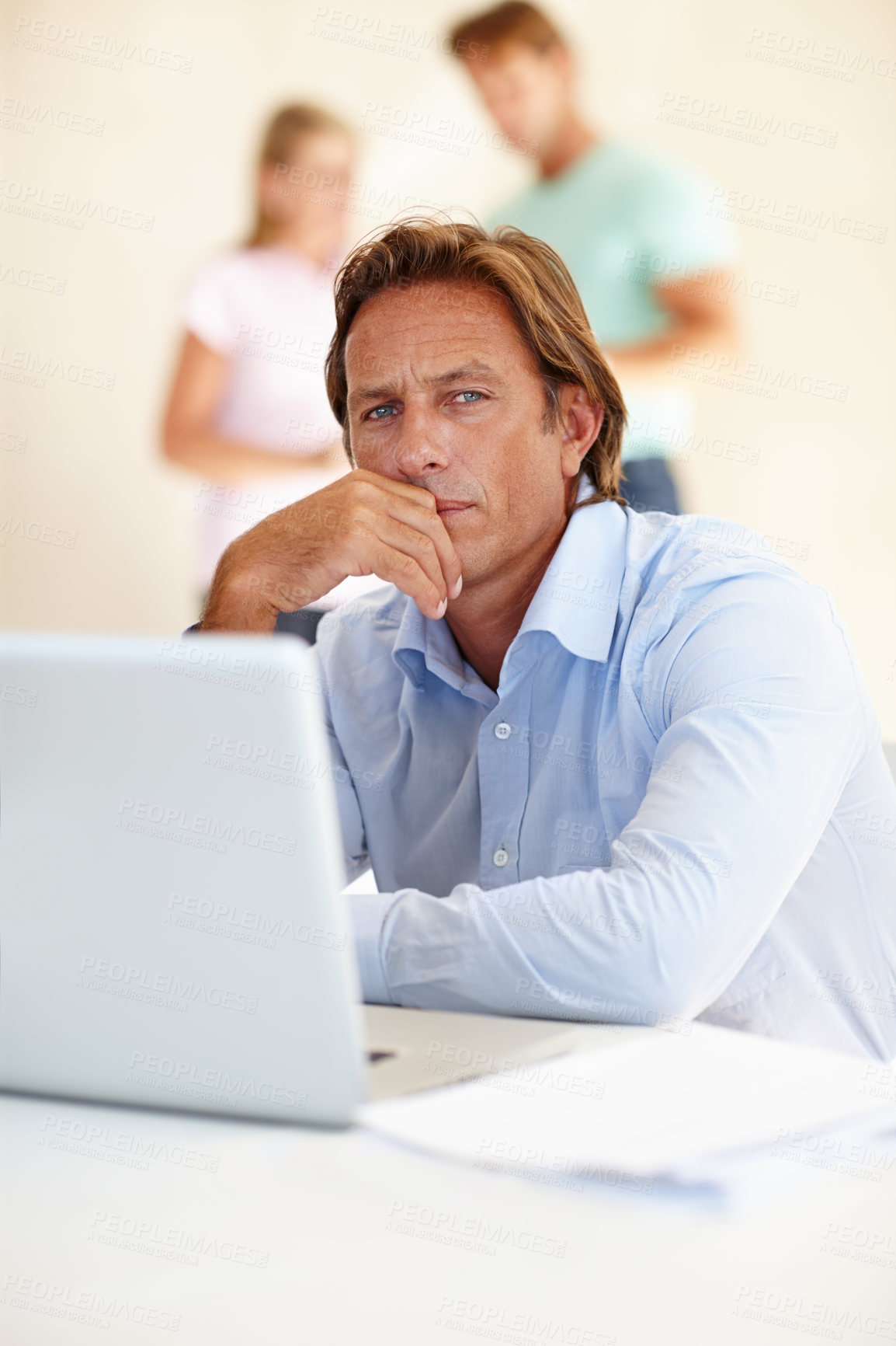 Buy stock photo Mature man, thinking and portrait with laptop in office for internet, research online and website for company. Business person or editor and serious for planning with tech for email and vision