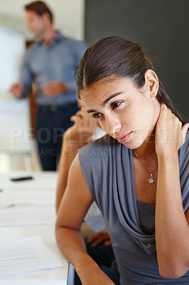 Buy stock photo Meeting, business and woman with stress, neck pain and overworked with a deadline and anxiety in a modern office. People, employee or financial consultant with a headache or medical issue with crisis