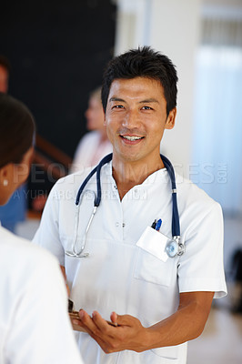 Buy stock photo Asian doctor, portrait and discussion with report, results and paperwork for health and wellness. Cardiologist, stethoscope and medical chart for healthcare, insurance and professional diagnosis