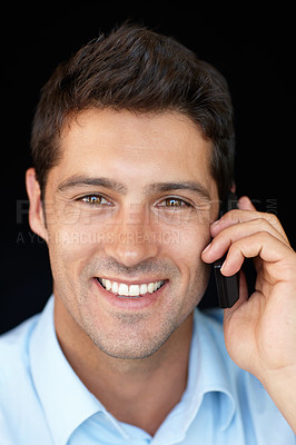 Buy stock photo Phone call, smile and businessman in portrait in studio, speaking on mobile conversation, business deal or networking. Consultant or man, communication and connect with smartphone on black background