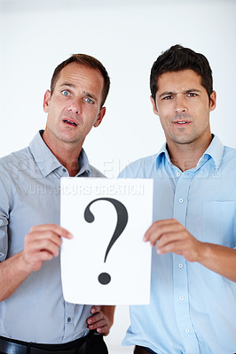 Buy stock photo Confused, businessmen and question mark on paper for unsure, company and colleagues isolated on white background. Male people, professional and teamwork for workplace regulations, staff and studio.