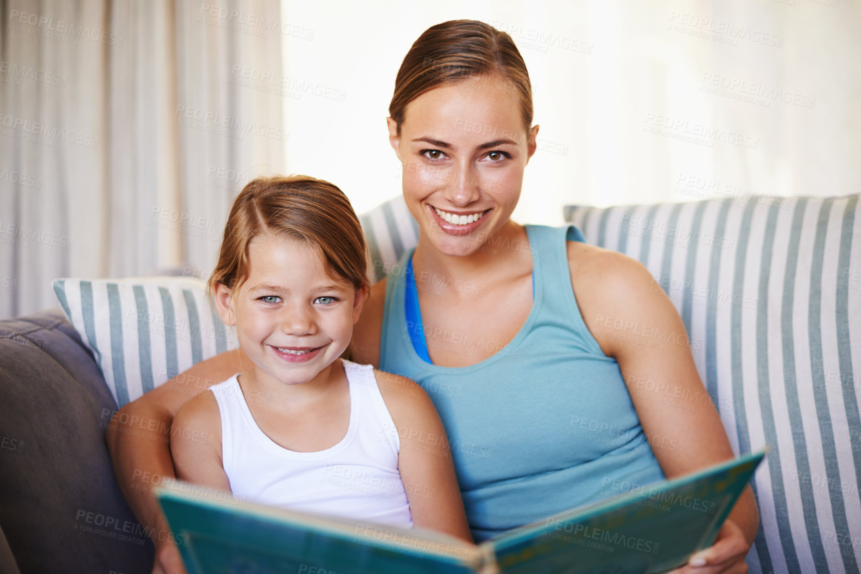 Buy stock photo Mother, child and portrait on sofa with book for reading and learning for english literature or language skills for development. Mom, girl and relax with smile on couch in home with love and bonding.