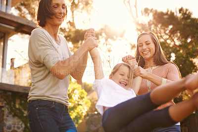 Buy stock photo Smile, swing and women with kid in backyard for love, bonding and childhood development outside home. Family, mother and grandmother with daughter in nature for support, summer holiday and happiness