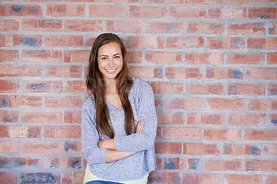 Buy stock photo Portrait, confident or girl in brick wall, design or business as creative, professional or career. Young, female entrepreneur or arms crossed in pride of positive work experience in coworking office
