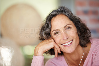 Buy stock photo Portrait of a mature woman leaning her head against her hand