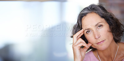 Buy stock photo Portrait shot of a mature woman looking thoughtful