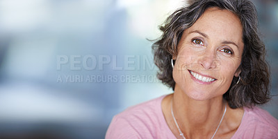 Buy stock photo Closeup shot of a mature woman sitting indoors