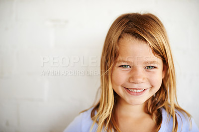 Buy stock photo Portrait, smile and girl child on a brick wall with youth, hair and childhood isolated on white background mockup space. Face, happy or adorable young kid, cute or positive schoolgirl in Switzerland