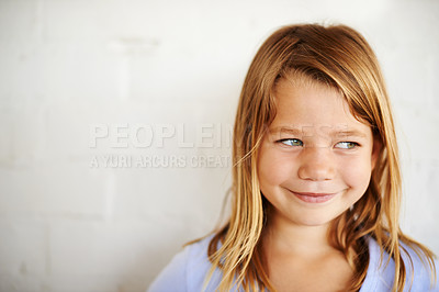 Buy stock photo Children, thinking or girl smile for idea, planning or brainstorming in house with questions on wall background. Solution, why or kid person at home for problem solving, learning or child development