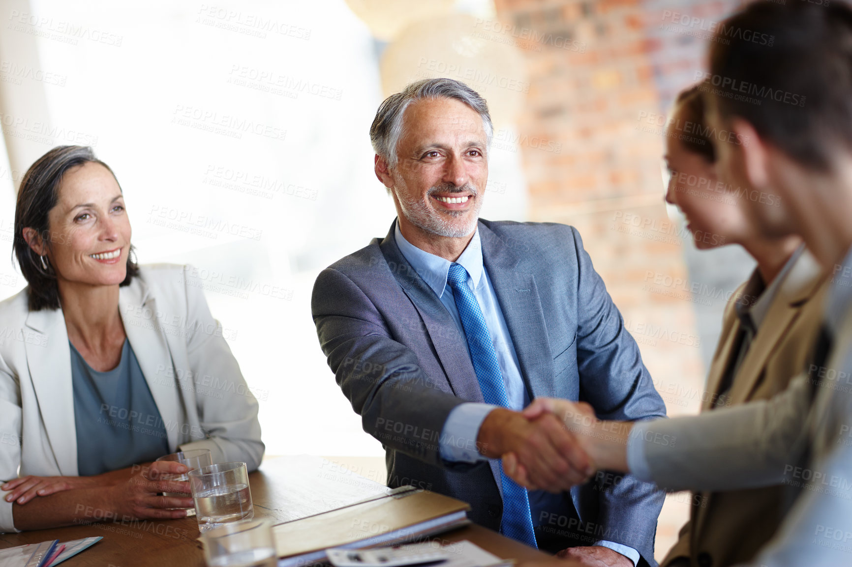 Buy stock photo Handshake, meeting and business people in office for teamwork, partnership or collaboration in boardroom. Introduction, recruitment and shaking hands for negotiation, agreement or company onboarding