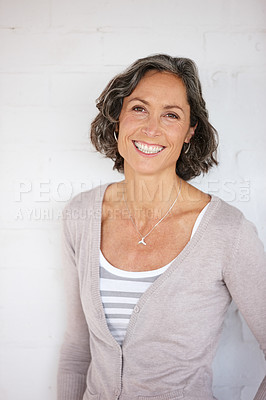 Buy stock photo A cropped shot of a happy mature woman isolated on a white background