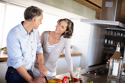 Buy stock photo Food, love and senior couple cooking in kitchen with vegetables for healthy, breakfast at home. Support, retirement and old people in house with salad for diet, balance or meal prep nutrition