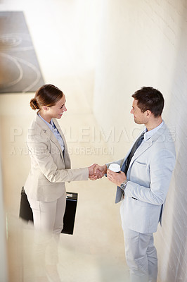 Buy stock photo Top view, greeting or business people shaking hands in office for b2b negotiation, success or discussion. Smile, coffee or worker with handshake to welcome an employee speaking of partnership deal