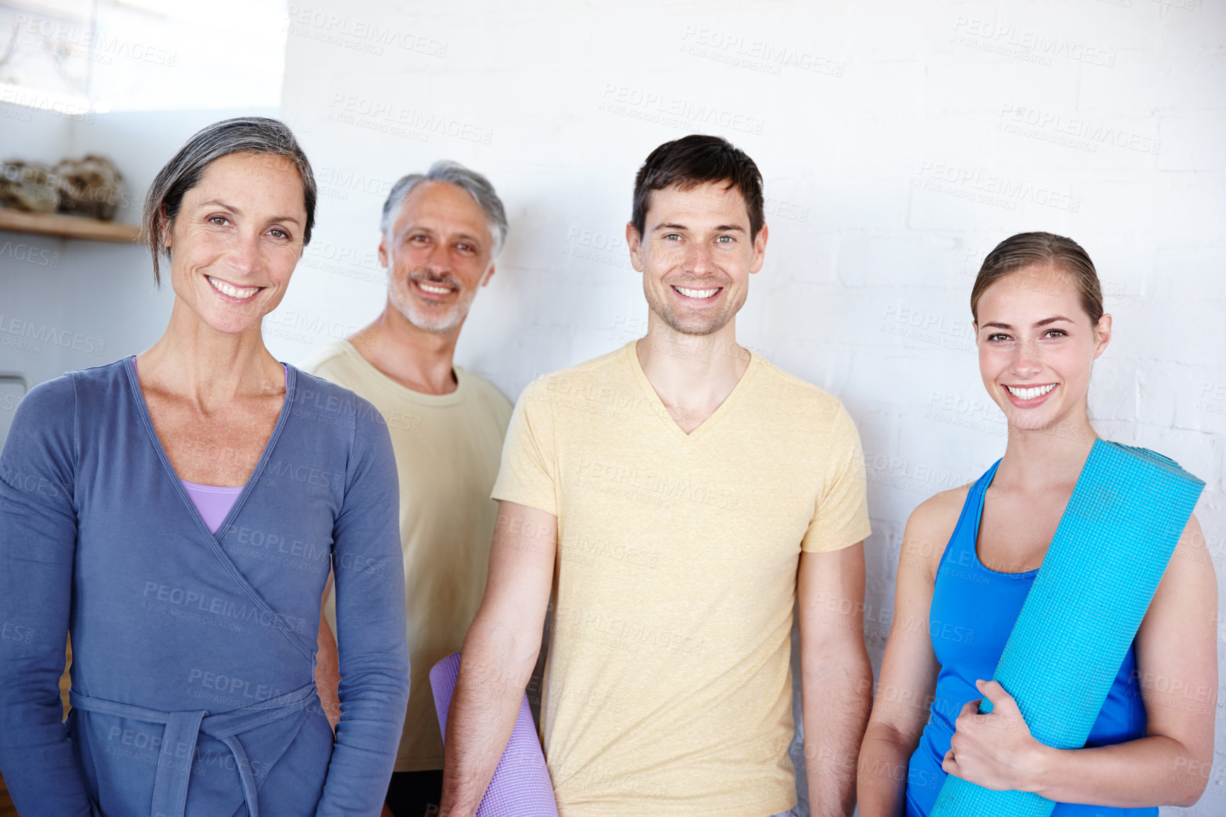 Buy stock photo A group of people tstanding together after gym class