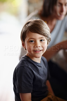 Buy stock photo Portrait, boy and child in home to relax in living room of apartment with parent. Face, cute and adorable young kid in lounge with casual clothes or family bonding together in house in Switzerland