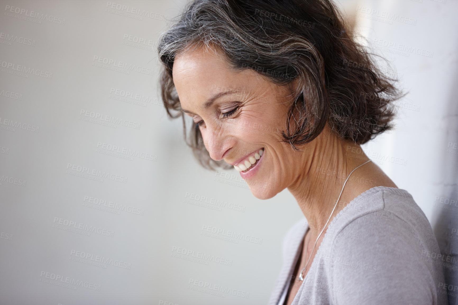 Buy stock photo Closeup, happy and mature woman in home or smile, thinking of success or future of happiness, wellness and health or anti age, skincare mockup. Person, face and confidence with natural, skin and hair