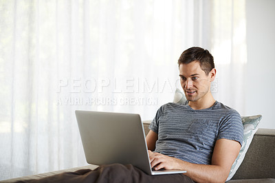 Buy stock photo Relax, remote work and man on sofa with laptop for working from home, freelance job and career.  Business, startup and person on computer for typing email, planning or internet research on website