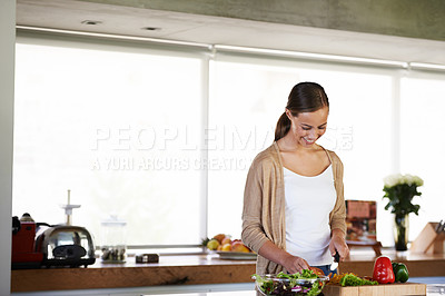 Buy stock photo Woman, home and happy or preparing for salad with peppers, healthy or wellness or vegan. Female person, house or joyful with ingredients in kitchen for dinner, diet or vegetables or greens for recipe