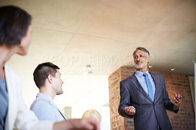 Buy stock photo Presentation, teamwork or senior businessman teaching advice tips for seminar or skill development in meeting. CEO, workshop or mature leader talking in mentorship, training or coaching for learning