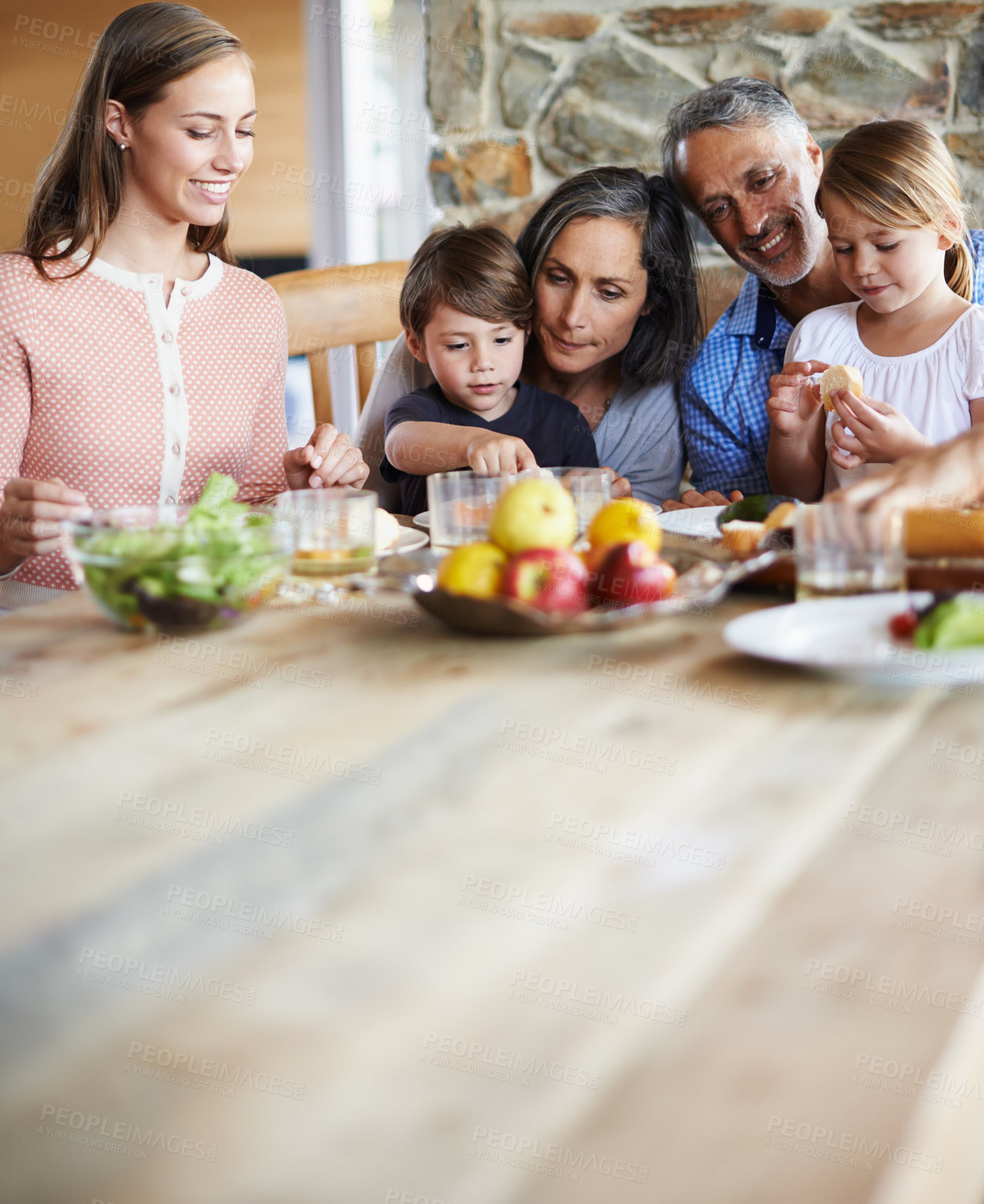 Buy stock photo Family, healthy and brunch table and food for eating, wellness snack with generations or grandparents together. Happy, home and nutrition or vitamins in meal for child, salad or fruits with beverages