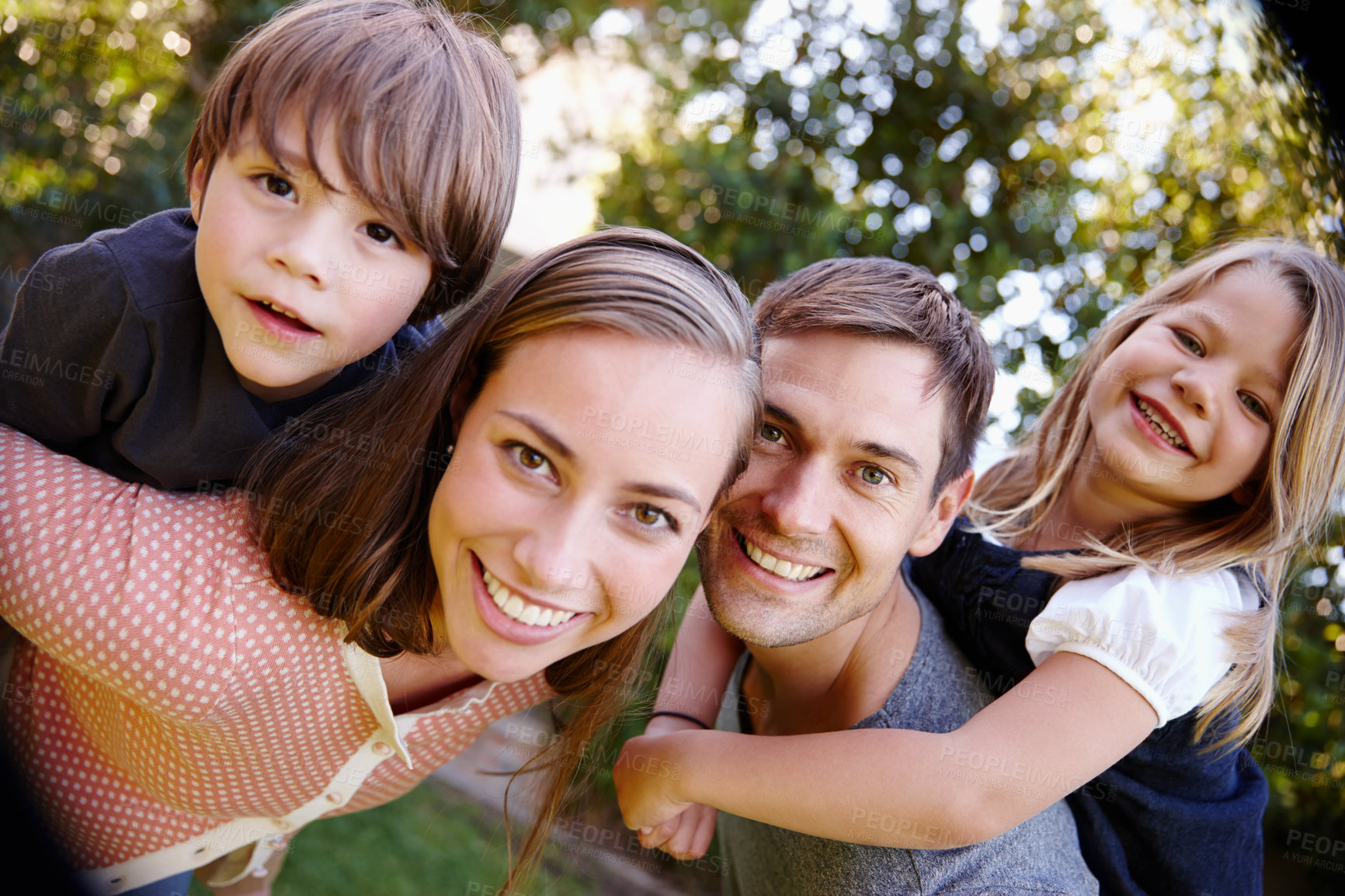 Buy stock photo Portrait, smile and family outdoor in nature for love, bonding and piggyback for siblings together. Happy parents, face and carrying kids at garden for connection with mother, father and children