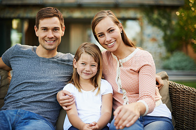 Buy stock photo Portrait, happy and family outdoor at backyard for love, bonding and relax together with child. Face, smile and parents at garden with girl for connection with mother, father or care of kid in summer