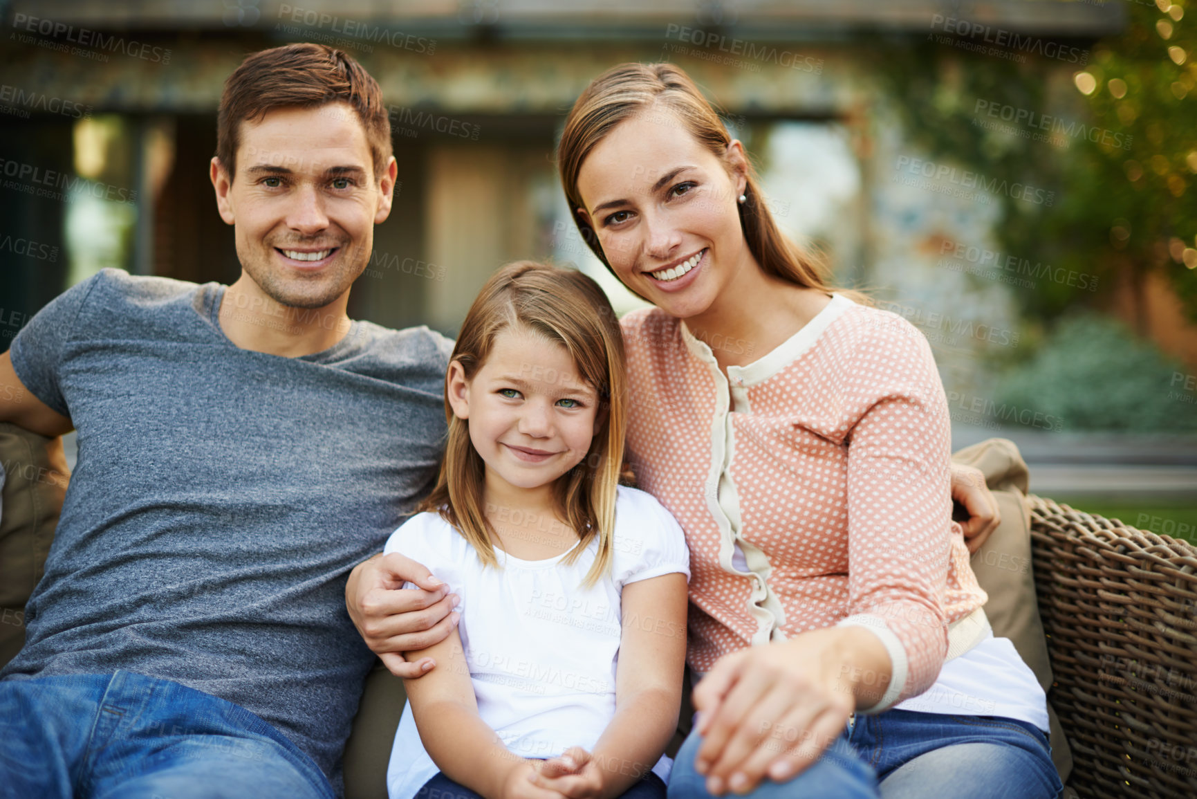 Buy stock photo Portrait, happy and family outdoor at backyard for love, bonding and relax together with child. Face, smile and parents at garden with girl for connection with mother, father or care of kid in summer