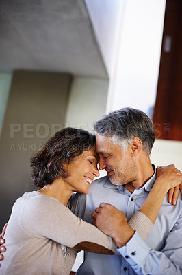 Buy stock photo Love, trust and mature couple hug in house with care, support or soulmate connection while bonding. Happy, safety or people embrace at home for romance, security or sharing moment, dance or gratitude