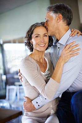 Buy stock photo Portrait, smile and couple with hug, embrace and relationship with love or happiness at home. Face, man and happy woman with kiss on forehead, affection and bonding with marriage or romantic
