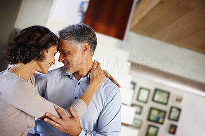 Buy stock photo Trust, love and mature couple hug in house with care, support or soulmate connection while bonding. Happy, safety or people embrace at home for romance, security or sharing moment, dance or gratitude