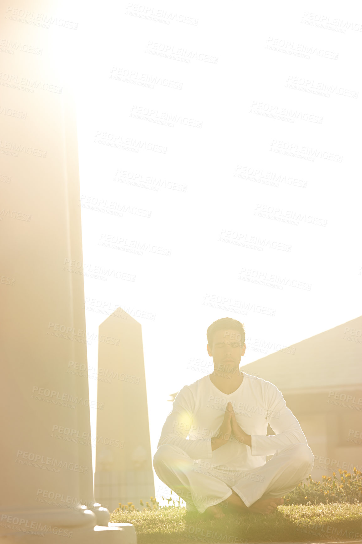 Buy stock photo Man, sunshine and meditation for yoga outdoor, zen and wellness with prayer hands for holistic healing. Calm, peace and natural light with fresh air, mindfulness and energy balance for aura in park