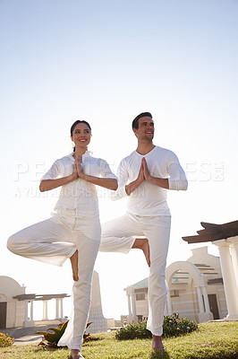 Buy stock photo Smile, tree pose and couple at yoga retreat with balance, peace and relax in mindfulness at outdoor resort. Zen, man and woman with holistic health, spiritual wellness and namaste with hands on grass