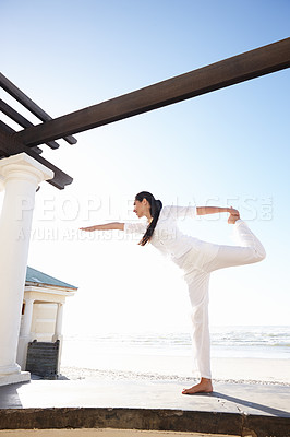 Buy stock photo Woman, yoga or dancer pose on beach in mindfulness, practice of meditation as health and fitness. Female yogi or natarajasana or leg to workout as spiritual, zen or wellness for balance and gratitude