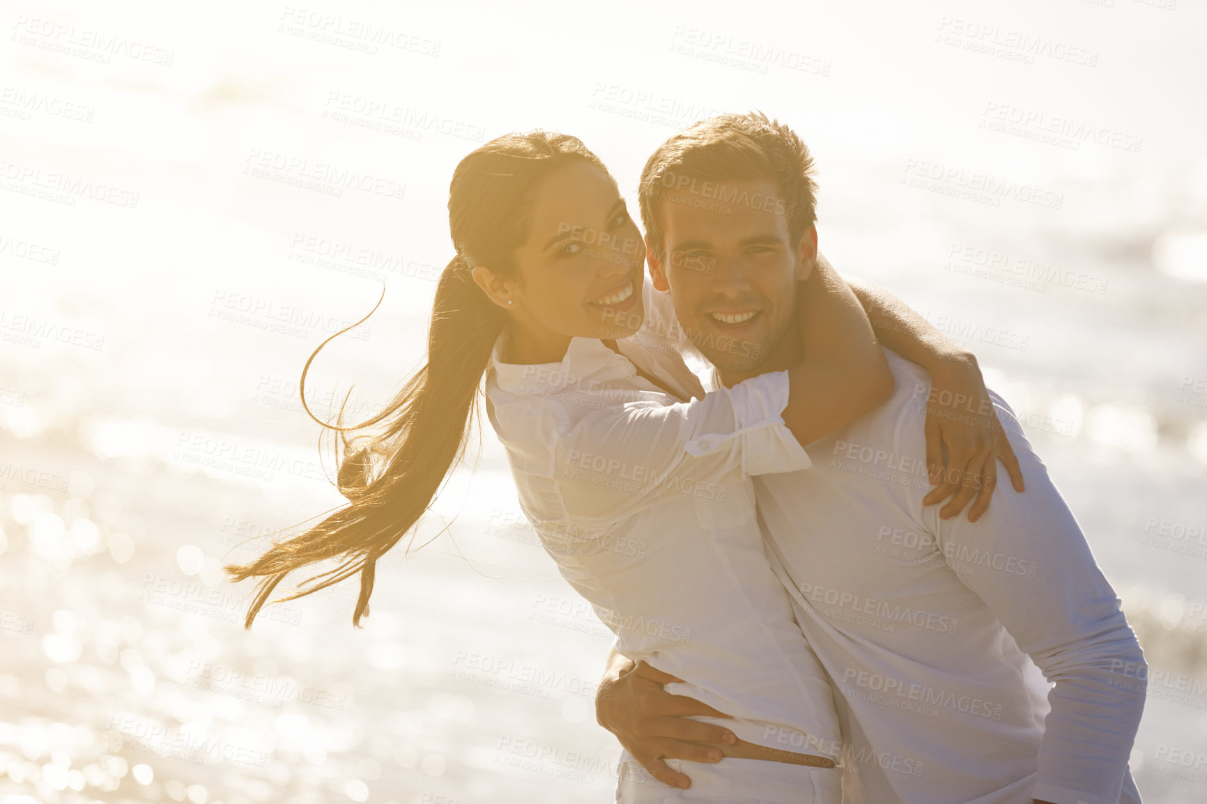 Buy stock photo Sunset, hug and portrait of couple on beach for bonding, relax together and relationship by ocean. Dating, travel and man and woman embrace for romance on holiday, vacation and weekend in nature