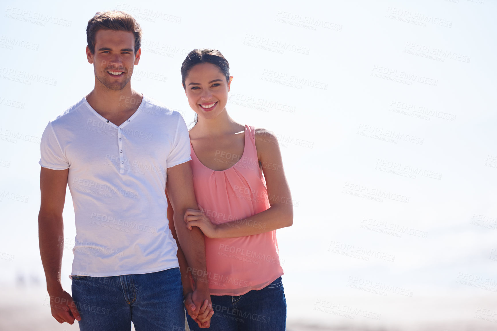 Buy stock photo Happy couple, portrait and beach with hug for embrace, care or support on outdoor holiday or vacation in nature. Man and woman with smile for love, relationship or weekend by ocean on mockup space